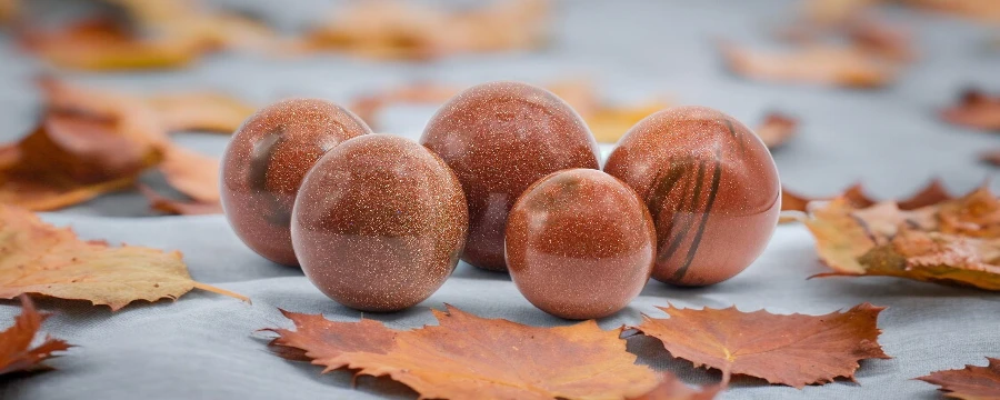 Bulk Red Goldstone Sphere