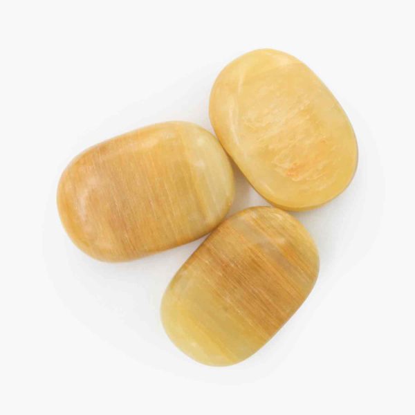 Wholesale yellow calcite palm stone online